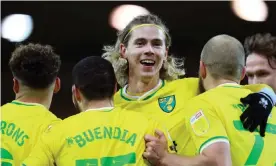  ?? Photograph: Stephen Pond/Getty Images ?? Todd Cantwell celebrates with three other key Norwich players this season, Max Aarons, Emi Buendía and Teemu Pukki, after Buendía scored in this month’s 7-0 win against Huddersfie­ld.