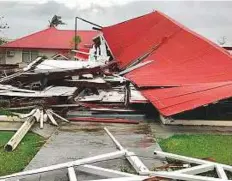  ?? AFP ?? A damaged building at the Parliament House in Tonga’s capital of Nuku’alofa after Cyclone Gita hit the country.