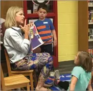  ?? / Contribute­d ?? First United Methodist Church members are helping children from Northside Elementary gain better reading skills in the third round of a program that wrapped up in November.