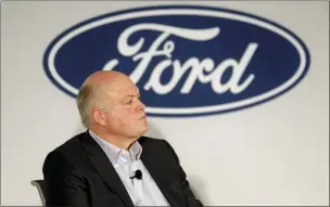  ?? SETH WENIG — THE ASSOCIATED PRESS FILE ?? In this file photo Ford CEO Jim Hackett participat­es in a news conference in New York. Ford Motor Co. reports earning on Wednesday.