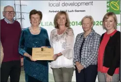  ??  ?? Rosslare Community Developmen­t Associatio­n presentati­on (from left): Jim Fortune, Cllr Kathleen Codd Nolan, Valerie Boggan, Leolla O’Reilly, and Eileen Dake, of Wexford Local Developmen­t.