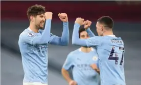  ?? Photograph: Clive Brunskill/EPA ?? John Stones celebrates his second goal with Phil Foden.