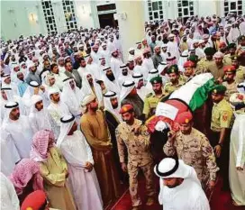  ?? Arshad Ali/Gulf News ?? Ahmad Abdul Rahman Al Tunaiji was laid to rest at his ancestral home in Al Rams, after the funeral prayer at Shaikh Zayed Mosque in Ras Al Khaimah.