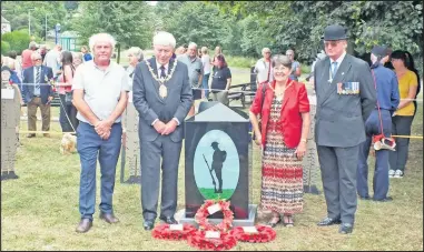  ??  ?? ■ Pictured, left to right, Coun Roy Campsall, the Mayor and Mayoress of Charnwood Coun David Snartt and his wife Joan, and Colonel Robert Martin representi­ng the Royal British Legion, at the Thorpe Acre war memorial unveiling. Photo by John Bush