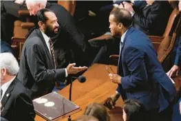  ?? ANDREW HARNIK/AP ?? Democratic Rep. Al Green of Texas, left, talks with GOP Rep. Byron Donalds of Florida on Thursday. Donalds has been nominated several times to oppose House Republican leader Kevin McCarthy for the House speakershi­p.