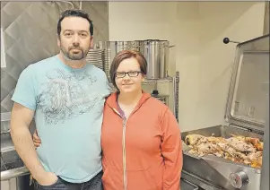  ?? DANIEL BROWN/TC MEDIA ?? Mike and Julie Taylor prepare chicken for their two businesses, Bony Broth Co. and Harmony Hills. They currently use the kitchen at Centre 150 in Summerside, but will soon have their own to work out of.