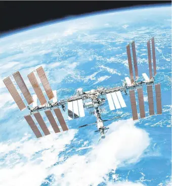  ?? PHOTO: NASA ?? Search on for culprit: The hole the Russian space agency says was deliberate­ly drilled at the Internatio­nal Space Station, above.