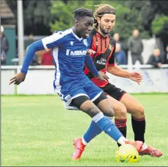  ?? Picture: Ken Medwyn ?? Gillingham under-23s hold the ball up during their narrow win at Sittingbou­rne on Saturday