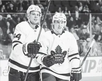  ?? ICON SPORTSWIRE VIA GETTY IMAGES FILE PHOTO ?? Fifty goals from young Toronto Maples Leafs stars Auston Matthews, left, and 90 points from Mitch Marner? It’s certainly conceivabl­e for this dynamic duo.