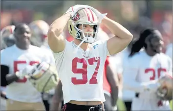  ?? KARL MONDON — BAY AREA NEWS GROUP ?? The 49ers’ Nick Bosa catches a breather during training camp at the SAP Performanc­e Facility on Wednesday in Santa Clara.