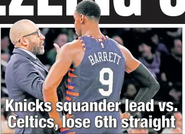  ??  ?? LET’S TALK: David Fizdale talks with RJ Barrett during the Knicks’ 113-104 loss to the Celtics. Robert Williams (right) dunks over Wayne Ellington as owner James Dolan (inset) was left scratching his head.