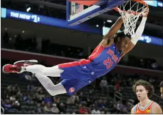  ?? CARLOS OSORIO — THE ASSOCIATED PRESS ?? Detroit Pistons guard Jaden Ivey (23) dunks during the second half of Monday’s game against the Oklahoma City Thunder in Detroit.