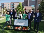  ?? LONGMONT AREA CHAMBER OF COMMERCE — COURTESY PHOTO ?? Longmont United Hospital and the Longmont Chamber recognize Longmont Food Rescue with $1,500 donation in 2021.