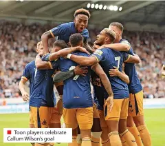  ?? ?? ■ Toon players celebrate Callum Wilson’s goal