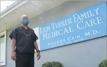  ?? JASON DEAREN — THE ASSOCIATED PRESS ?? Dr. Rogers Cain stands outside his family medical clinic July 30 in north Jacksonvil­le, Fla. Over the past two decades, he has seen the county health department gutted of money and people, hampering Duval’s ability to respond to outbreaks, including a small cluster of tuberculos­is cases in 2012.