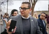  ?? ANDREW HARNIK — THE ASSOCIATED PRESS FILE ?? Rep. George Santos, R-N.Y., leaves a House GOP conference meeting on Capitol Hill in Washington on Jan. 25.