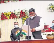  ?? HT PHOTO ?? Hafizul Ansari takes oath as a minister at Raj Bhawan in Ranchi on Friday.