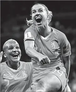  ?? FRANCK FIFE/GETTY-AFP ?? Netherland­s’ midfielder Jackie Groenen, right, celebrates after scoring a goal.