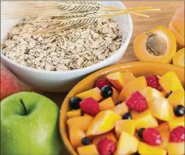  ?? DREAMSTIME ?? Pectin from apples and resistant starches in 100 percent whole-grain foods are helpful for managing Type 2 diabetes.