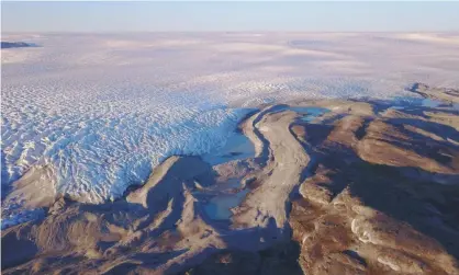  ?? Photograph: Jason Briner/University at Buffalo/PA ?? If the Greenland ice sheet were to melt completely, sea levels would eventually rise by about 7 metres.