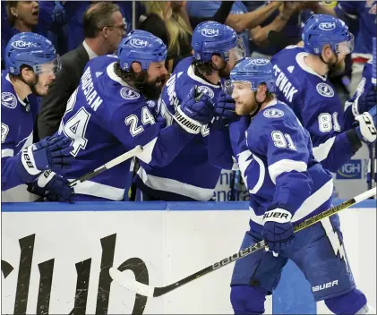  ?? CHRIS O’MEARA — THE ASSOCIATED PRESS ?? Tampa Bay Lightning center Steven Stamkos (91) celebrates with the bench after his goal against the Rangers during the third period in Game 6.