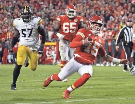  ?? DENNY MEDLEY/USA TODAY SPORTS ?? Chiefs quarterbac­k Patrick Mahomes (15) slides during the second half against the Steelers in Kansas City last weekend.