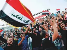  ?? AP ?? Supporters of the ‘Fatah Alliance’ take out a rally in Baghdad in the run-up to the parliament­ary elections on Tuesday.