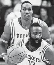  ??  ?? Rockets guard James Harden heads upcourt against the Pistons. Harden had 12 assists and 20 points.