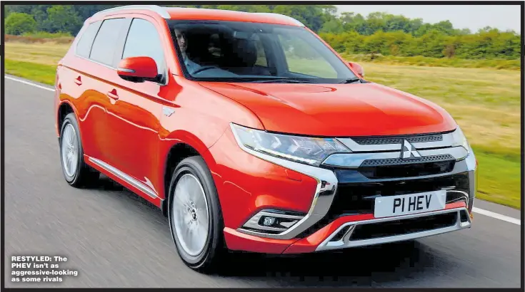  ??  ?? RESTYLED: The PHEV isn’t as aggressive-looking as some rivals