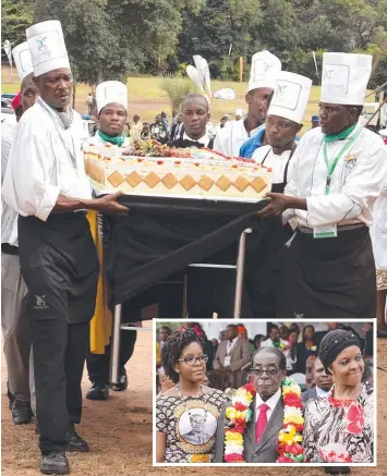  ?? Pictures: AFP ?? CONTROVERS­IAL: A team of chefs carries one of Robert Mugabe’s cakes for his party, celebrated (inset) with wife Grace and daughter Bona, who wore a photo of her father on her dress.
