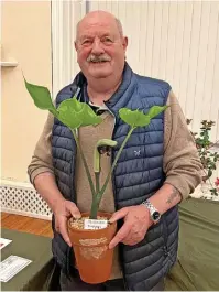  ?? Cliff Booker ?? ●●Norman Davies with his best in show Arisaema Ringens