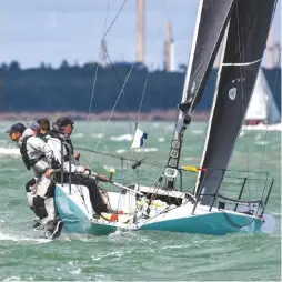  ??  ?? Left: BLT won her class easily during last year’s windy Cowes Week. Below: going well upwind. Note the pushpit and stanchions in black powder-coated stainless steel