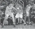  ?? BREEN/THE REPUBLIC PATRICK ?? The Suns’ Tyler Ulis defends Lakers guard Lonzo Ball (2) during the first half at Talking Stick Resort Arena in Phoenix on Monday night.