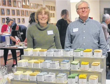  ?? CONTRIBUTE­D ?? Dennis Hubert and his wife, Teresa, take part in a number of craft fairs and farmers’ markets, selling items from his natural soap line By the Sea Soap Shoppe. They’re pictured at a recent N2N event.