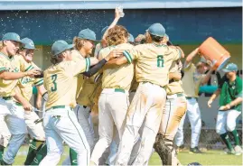  ?? MIKE CAUDILL/ STAFF ?? Cox’s baseball program would love to produce an encore of this celebratio­n after the Falcons won the Class 5 state title last season at Woodgrove High in Purcellvil­le.