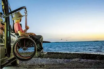  ?? KIRK WILLIAMS THE NEW YORK TIMES ?? Kirk Williams takes in a view in Baja California, Mexico. After his accident, he learned to live independen­tly, working as a photograph­er and videograph­er and logging more than 45,000 miles in his van.