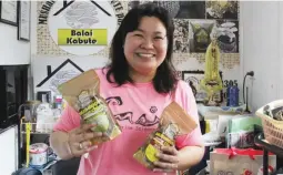  ??  ?? HEALTHY SNACKING - Kristine Salanap (in photo) advises that before starting a farm business, you should be aware of what the market is looking for. Balai Kabute offers snacks made out of the mushrooms that they grow for guilt-free snacking. (Photo courtesy of Balai Kabute Farm)
