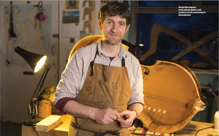  ??  ?? Kevin Harrington instrument maker and restorer at his workshop in Roundwood