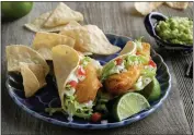  ?? COURTESY OF DEL TACO ?? Del Taco is partnering with Stone Brewing for its beerbatter­ed crisp fish tacos (two for $5).