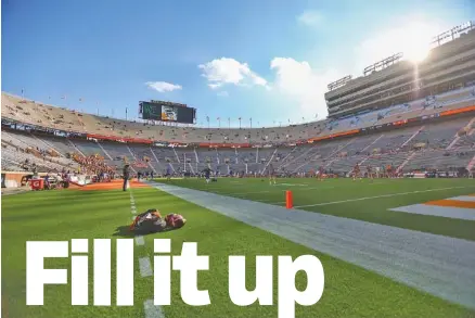  ?? RANDY SARTIN/KNOXVILLE NEWS SENTINEL VIA AP, POOL ?? Neyland Stadium, shown before the Vols’ game against Florida this past Dec. 5, had its capacity limited throughout the 2020 football season.