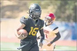  ??  ?? Novato High quarterbac­k JJ Moreno (16) runs against Kennedy of Richmond on Saturday.