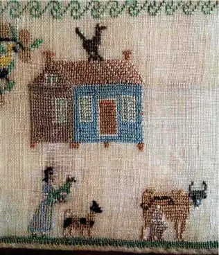  ??  ?? This undated sampler from the 18th or 19th century includes domestic farm animals and pets. It was not unusual for sampler makers to stitch motifs out of scale with each other; for example, the bird is larger than the rooftop and the girl is almost as...