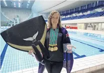  ?? PICTURES: LISA BORG ?? Terrific in Tokyo . . . Kathryn Nevatt with her treble of medals from the Pan Pacific Freediving Championsh­ips in Tokyo.