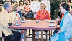  ??  ?? HRH Princess Maha Chakri Sirindhorn seated at the
‘teahouse’ for the performanc­e of the play. From left, Tharin Nimmanhaem­in, president of Siam Piwat, Khunying Barbara Steinle, honorary consul-general of Thailand for Bavaria and Saxonia, Ambassador of...