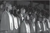  ??  ?? Members of the St. Charles High School combined choir perform “America the Beautiful” during graduation ceremonies Thursday night.