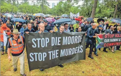  ??  ?? Black Monday: Protesters marched against farm murders in November 2017. AfriForum supported the protest but not the waving of the Vierkleur or the singing of ‘Die Stem’. Photo: Gallo Images/Rapport/Deon Raath