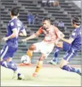  ?? SRENG MENG SRUN ?? Army midfielder Chhin Chhoeun attacks the Boeung Ket defence on Wednesday.