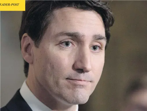  ?? ADRIAN WYLD / THE CANADIAN PRESS ?? Prime Minister Justin Trudeau apologized Wednesday after the ethics commission­er’s report chastised him for his vacation with the Aga Khan.