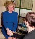  ??  ?? ICONIC MOMENT: Diana shaking hands with an AIDS patient in 1987