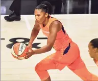  ?? Julio Aguilar / Getty Images ?? The Sun’s Alyssa Thomas dribbles up court against the Aces during the first half on Tuesday in Palmetto, Fla.